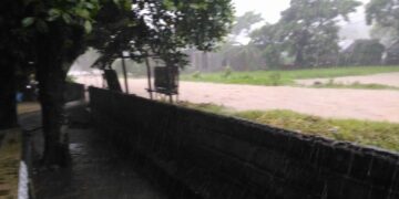 Flooded road of Barangay Taclobo, San Fernando town.