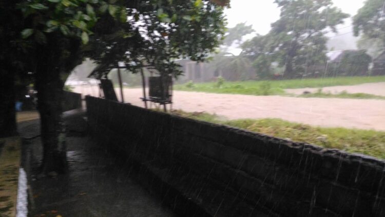 Flooded road of Barangay Taclobo, San Fernando town.
