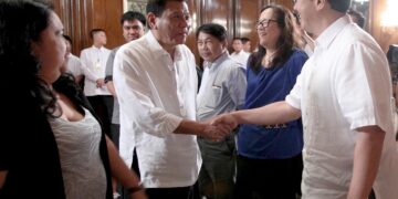 President Rodrigo R. Duterte shakes hands with Philippine Star President and CEO Miguel Belmonte during a courtesy call at the President's Hall in Malacanang on August 3, 2016. (Photo by Ace Morandante/PPD/PNA)