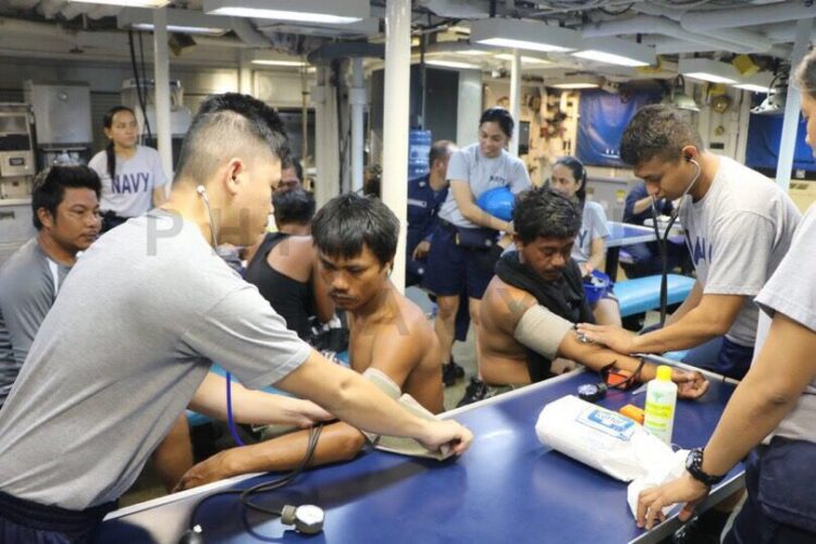 BFAR gives aid to 22 rescued fishermen