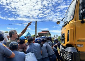 Sibuyan residents block mining truck pushing through barricades