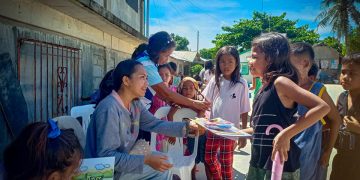 Book club visits remote schools in Tablas to distribute books and school kits