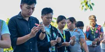 RSU faculty, students, staff light candles for Human Rights Victims