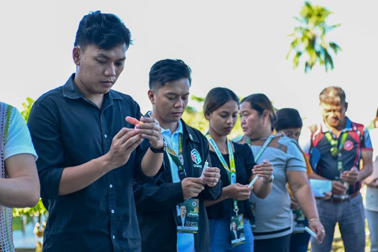 RSU faculty, students, staff light candles for Human Rights Victims