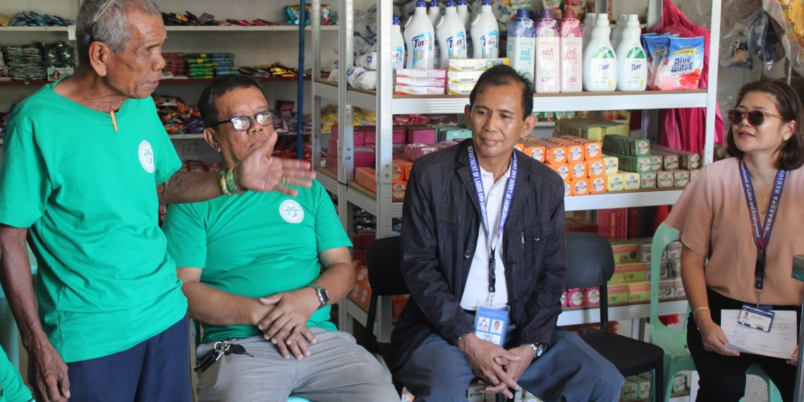 DOLE provides aid to Romblon farmers to boost coconut oil production