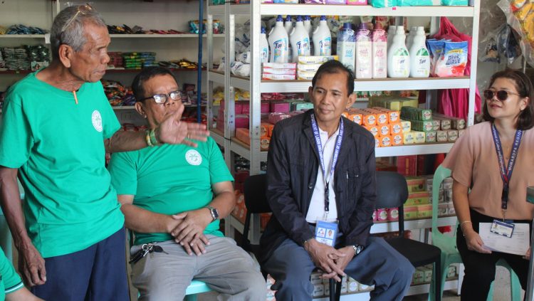 DOLE provides aid to Romblon farmers to boost coconut oil production
